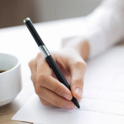 woman filling out an application