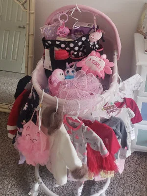 baby crib, clothes and toys