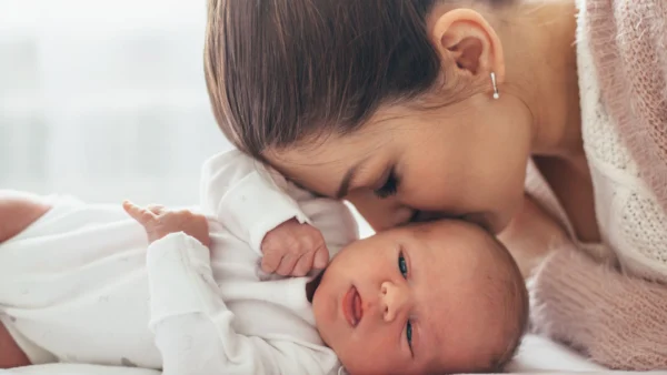 new mother holding her newborn baby